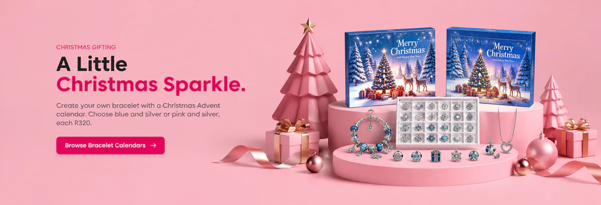 Blue and silver Christmas bracelet Advent calendars displayed in a pink festive scene